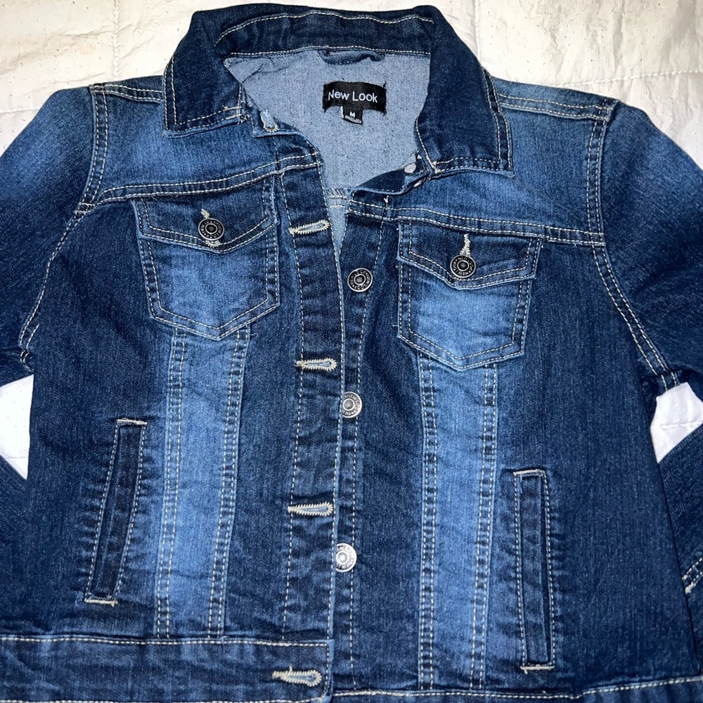 Blue jean jacket.